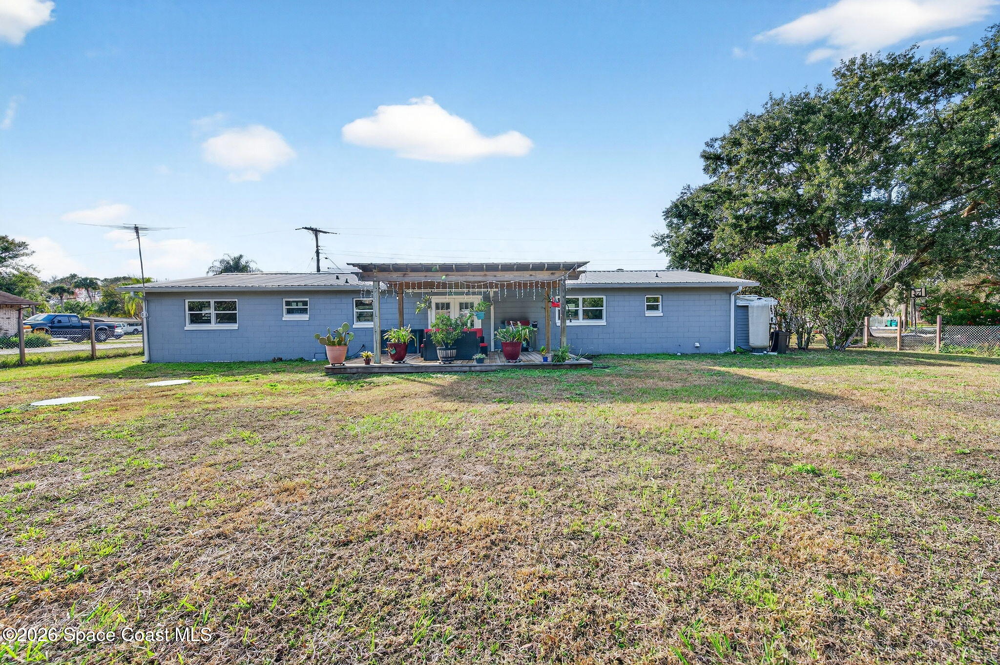 6033 Palm Street Mims, FL 32754 - Photo 39 of 44 a house view with a swimming pool