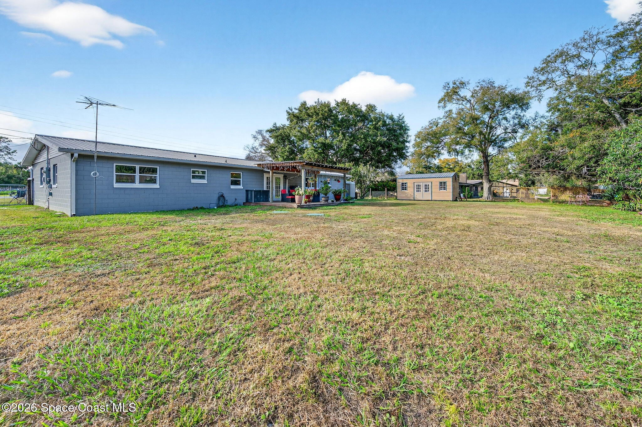 6033 Palm Street Mims, FL 32754 - Photo 40 of 44 a house view with a outdoor space