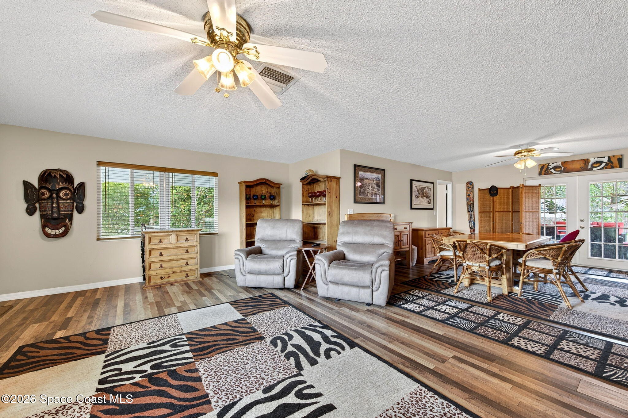 6033 Palm Street Mims, FL 32754 - Photo 7 of 44 a living room with furniture and a window