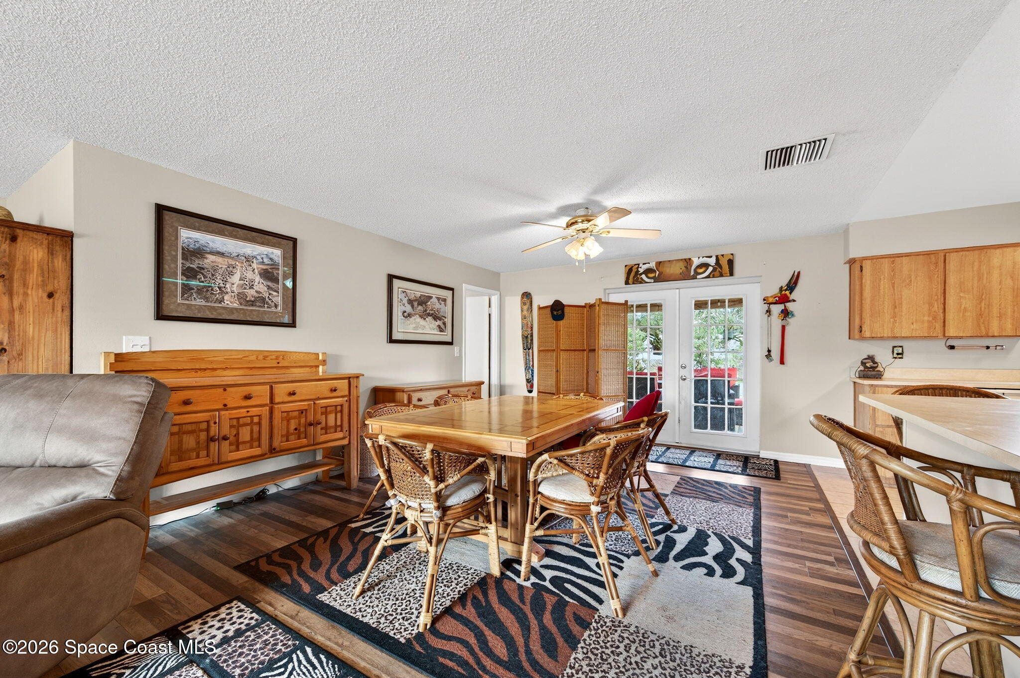 6033 Palm Street Mims, FL 32754 - Photo 9 of 44 a view of a livingroom and dining room