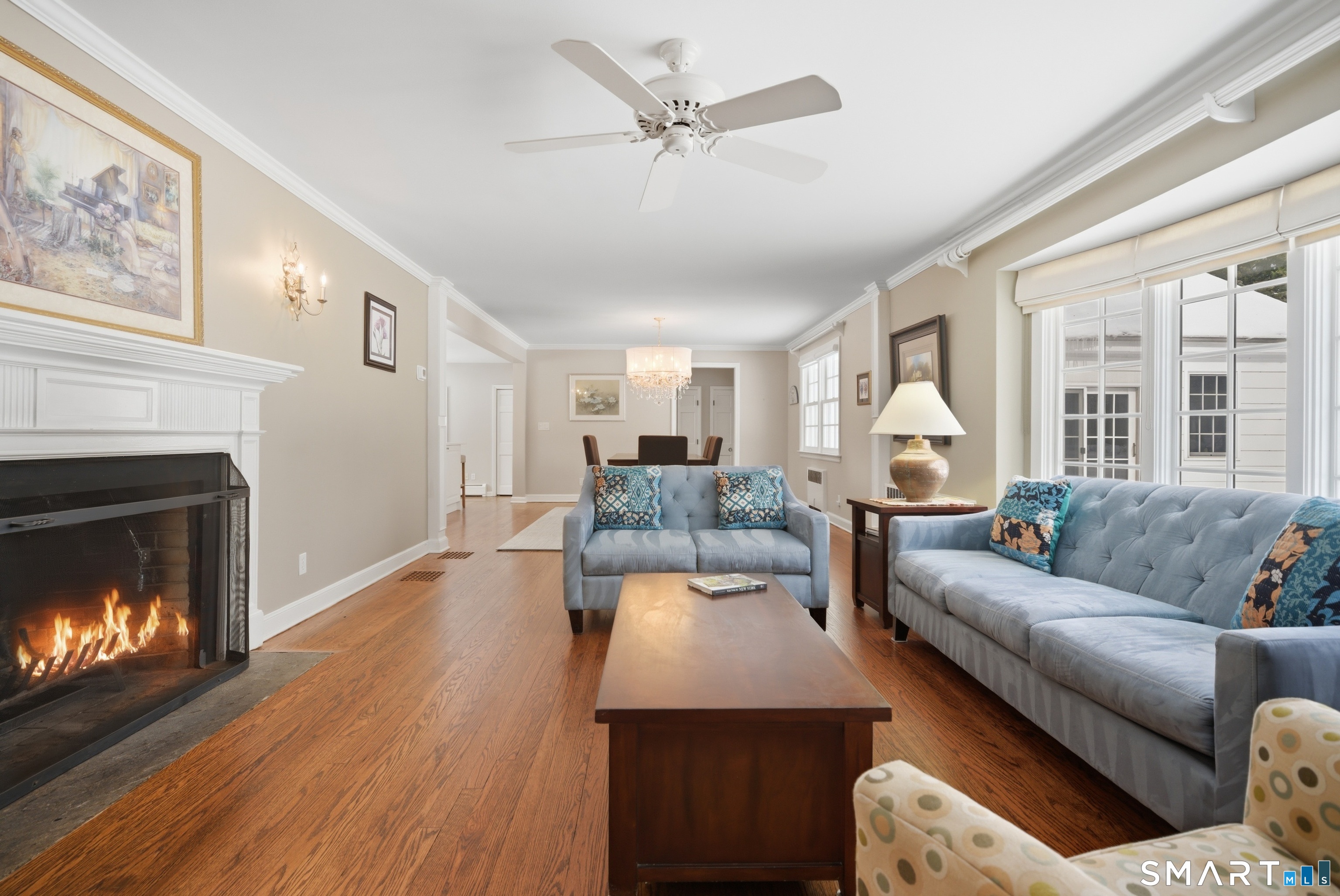 12 Dellwood Road Norwalk, CT 06850 - Photo 2 of 30 a living room with furniture and a fireplace