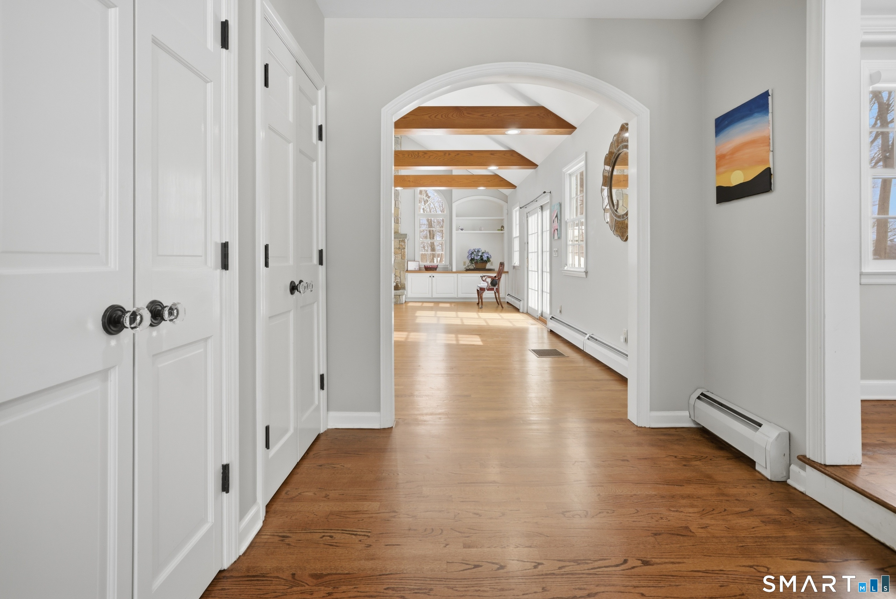 12 Dellwood Road Norwalk, CT 06850 - Photo 8 of 30 a view of a hallway with wooden floor and closet