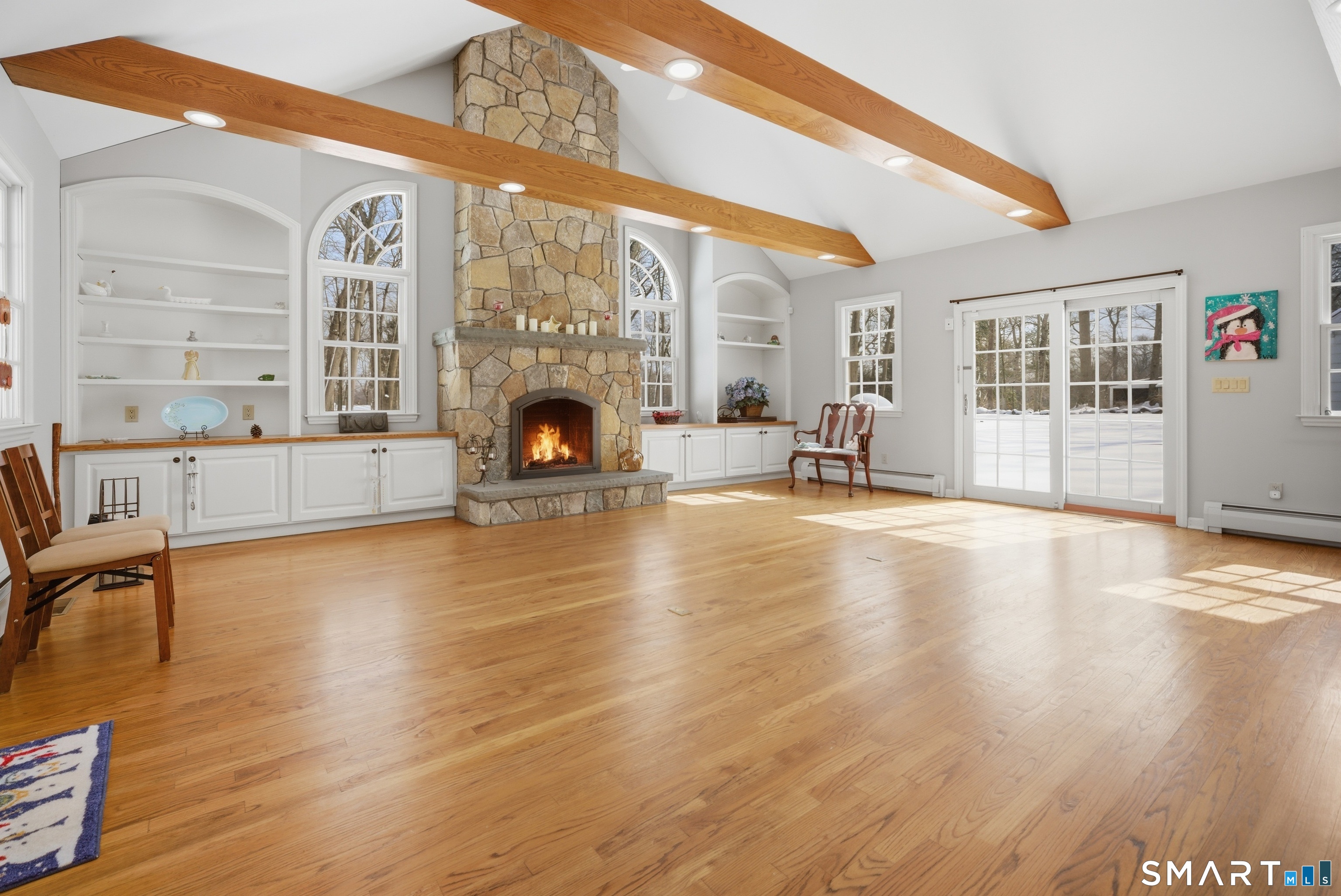 12 Dellwood Road Norwalk, CT 06850 - Photo 9 of 30 a living room with furniture and a fireplace