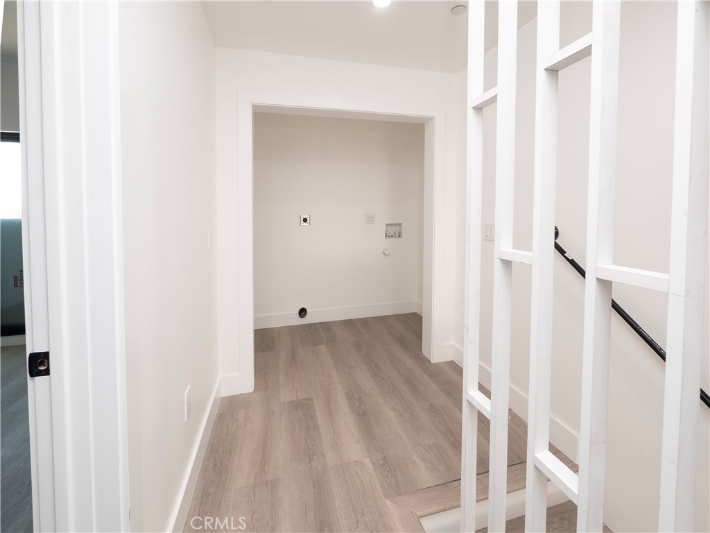 1571 Ricardo Street Los Angeles, CA 90033 - Photo 7 of 29 a view of a hallway with wooden floor and entryway