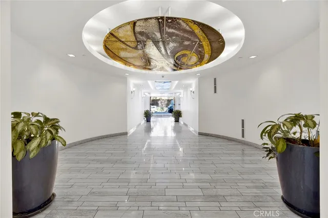 a view of an entryway with dining room and furniture