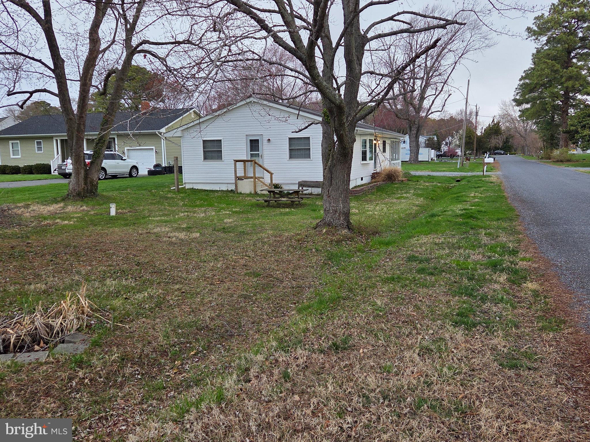 101 Queen Anne Road Stevensville, MD 21666 - Photo 2 of 9 a view of house with backyard