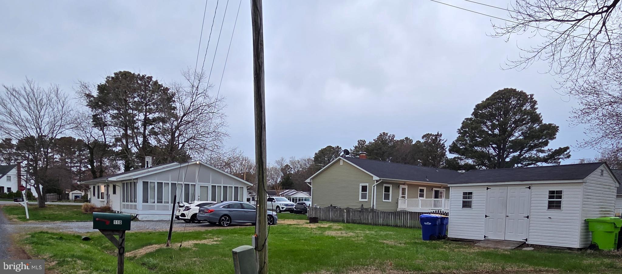 101 Queen Anne Road Stevensville, MD 21666 - Photo 5 of 9 a front view of a house with garden