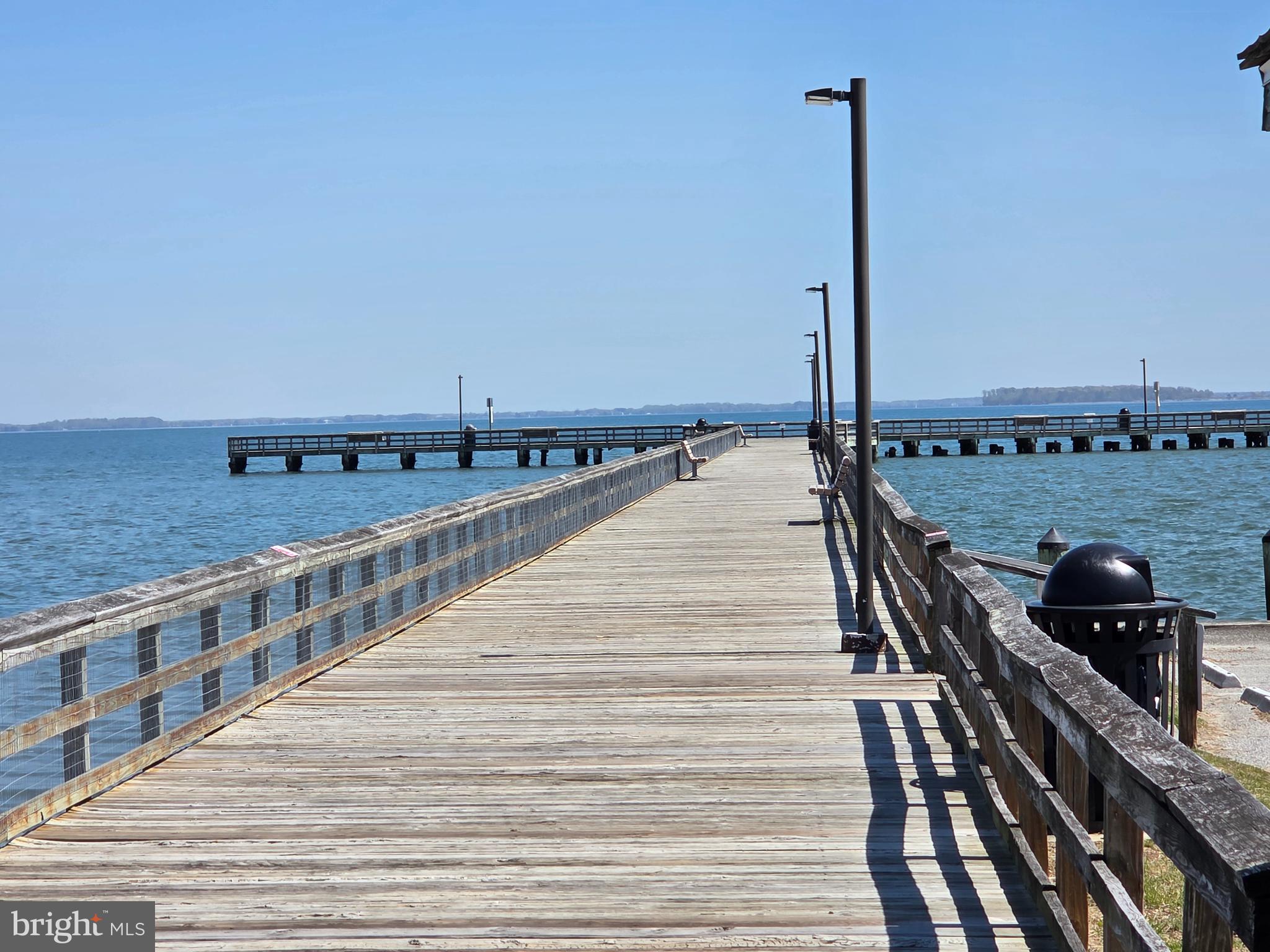 101 Queen Anne Road Stevensville, MD 21666 - Photo 6 of 9 a view of a balcony with two chairs