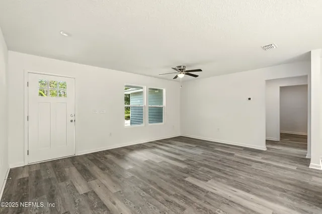a bathroom with a toilet and shower