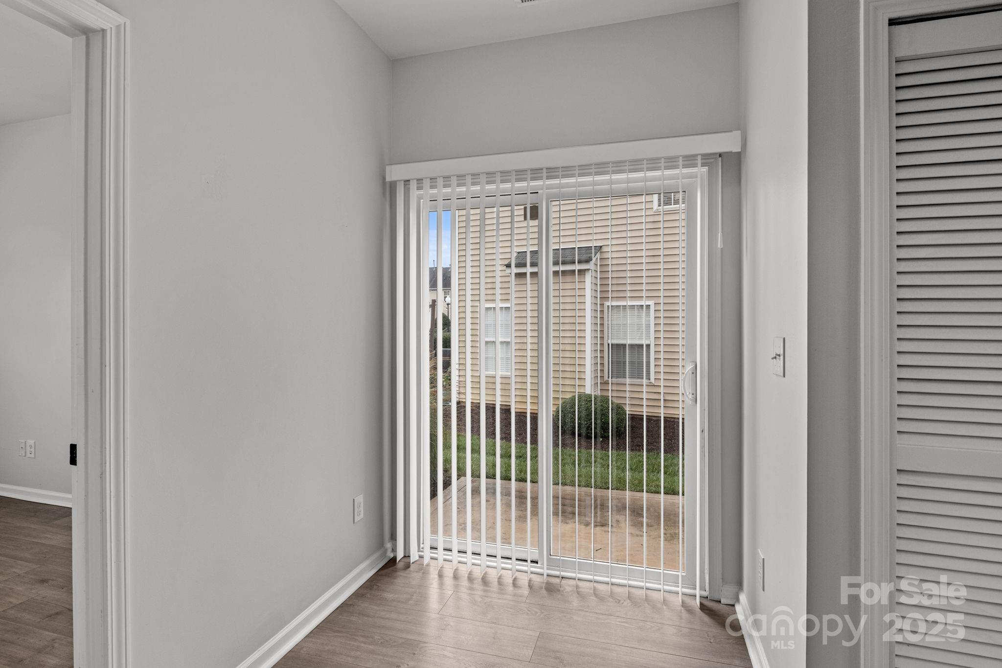 17744 Trolley Crossing Way Cornelius, NC 28031 - Photo 14 of 27 a view of a room that has a large window