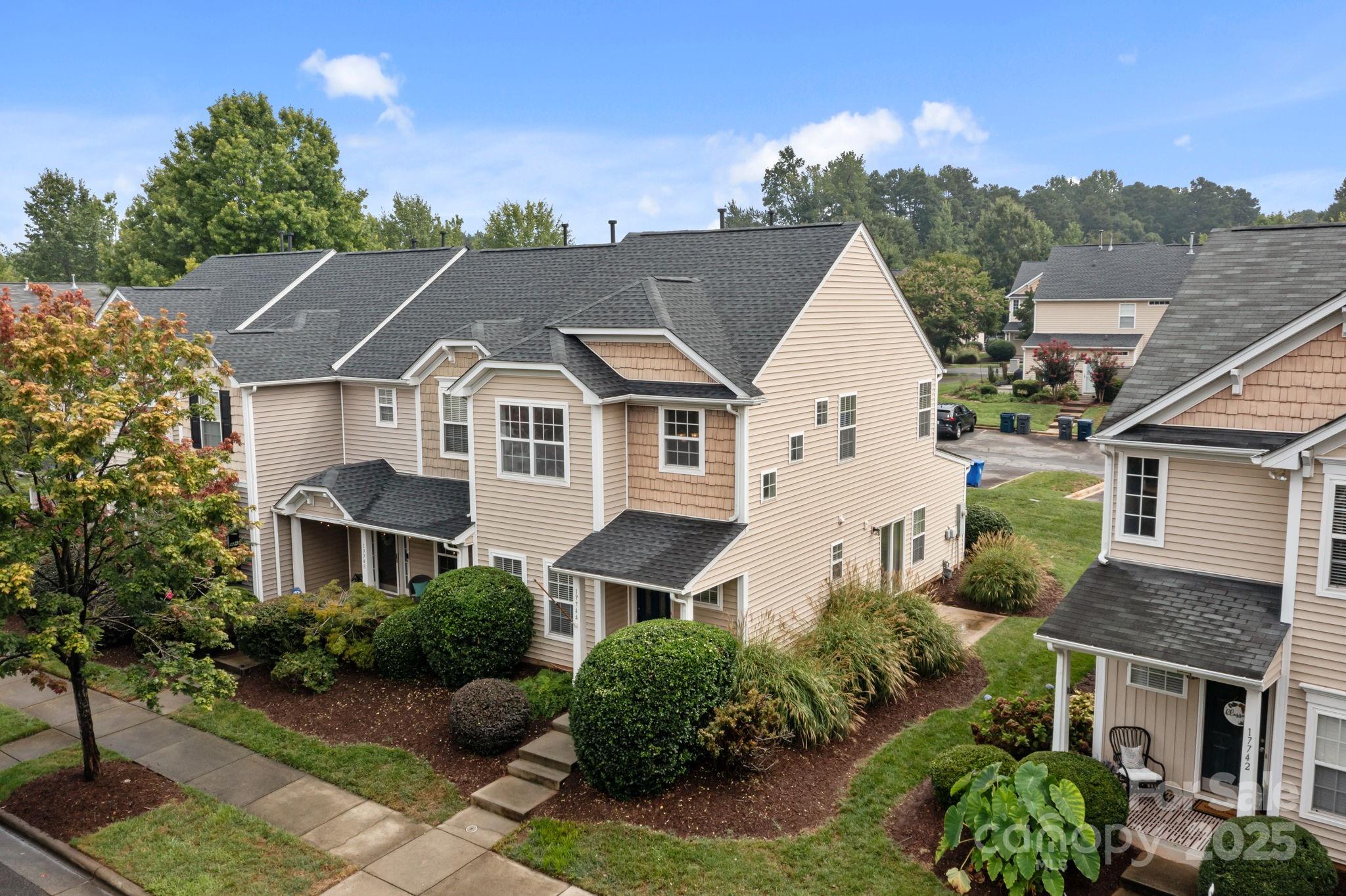 17744 Trolley Crossing Way Cornelius, NC 28031 - Photo 27 of 27 a view of outdoor space yard and front view of a house