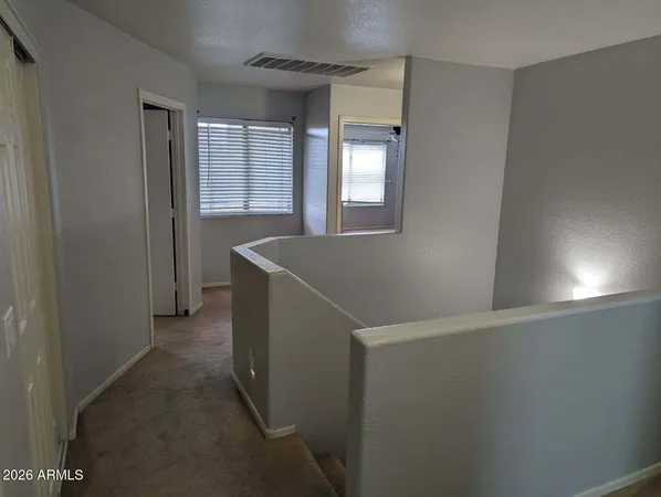 a view of hallway with window