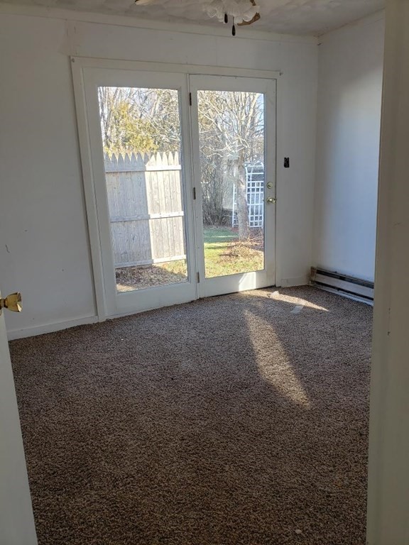 24 Wheelwright Road Barre, MA 01074 - Photo 4 of 4 an empty room with a window