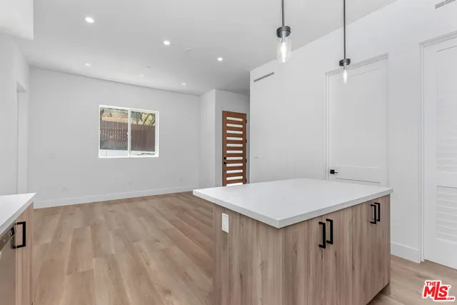 a view of kitchen and utility room
