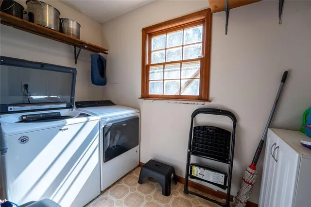 a kitchen with a sink and a stove top oven