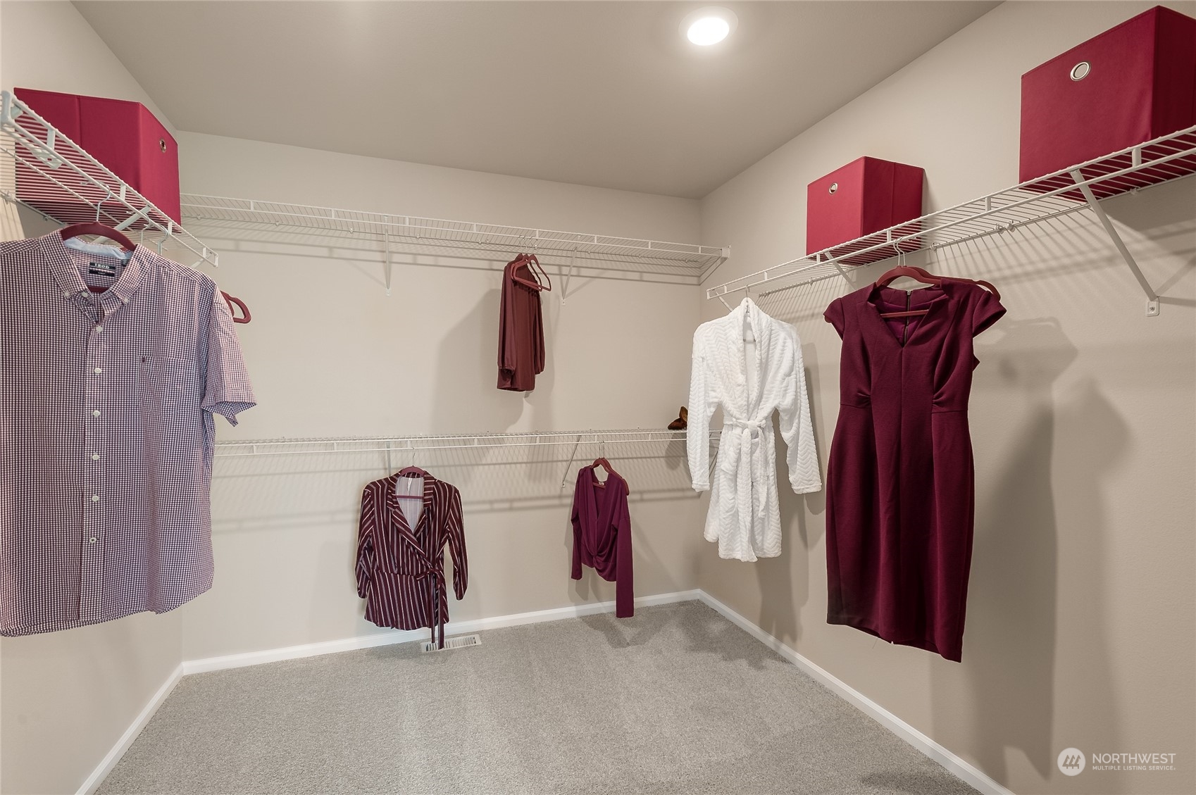 4015 233rd Street Southeast, Unit 8 Bothell, WA 98021 - Photo 15 of 18 a view of walk in closet with clothes and shoes