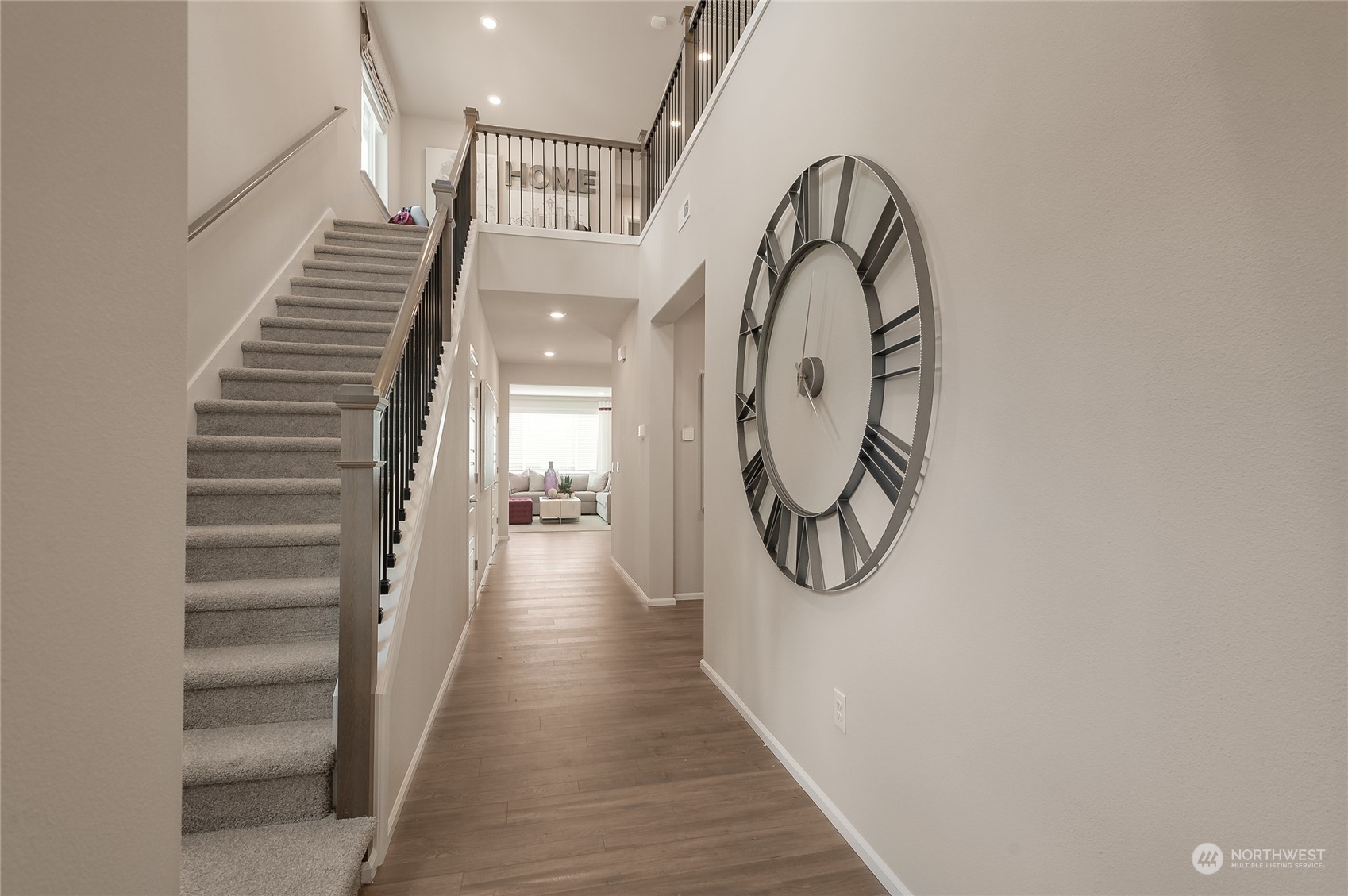 4015 233rd Street Southeast, Unit 8 Bothell, WA 98021 - Photo 2 of 18 a view of entryway and hall with wooden floor