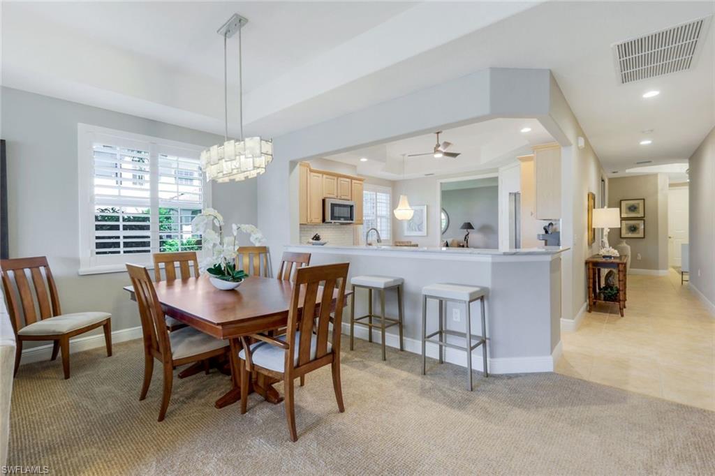 19620 Marino Lake Circle, Unit 2802 Fort Myers, FL 33913 - Photo 20 of 38 Dining room with natural light.