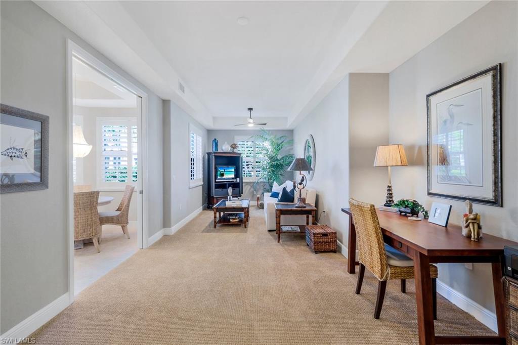 19620 Marino Lake Circle, Unit 2802 Fort Myers, FL 33913 - Photo 23 of 38 Office area featuring, ceiling fan, light carpet,