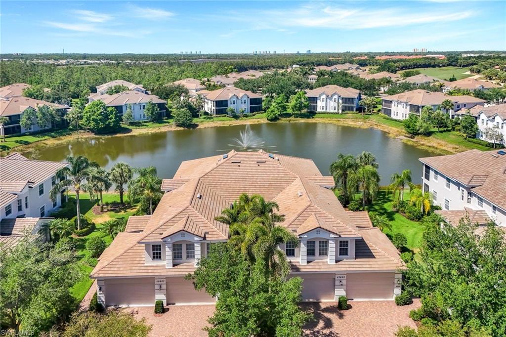 19620 Marino Lake Circle, Unit 2802 Fort Myers, FL 33913 - Photo 32 of 38 Bird's eye view with a residential view and a water view
