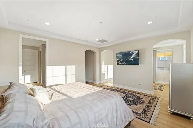 a living room with a sink and large window