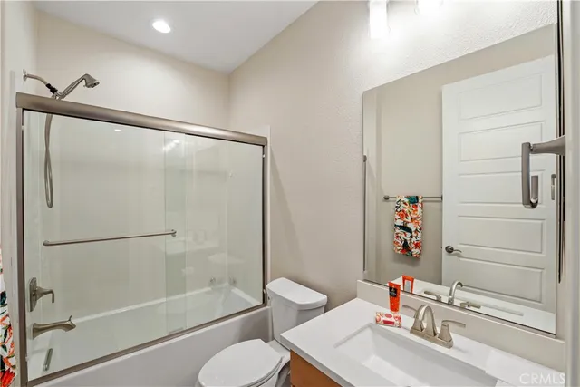 a view of a bathroom with a sink and a large window