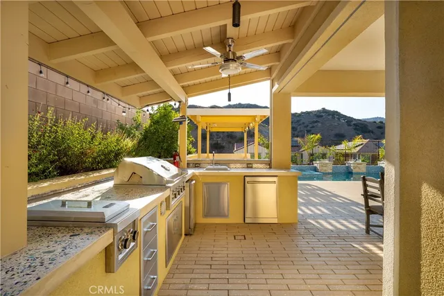 a view of swimming pool with a lounge chairs