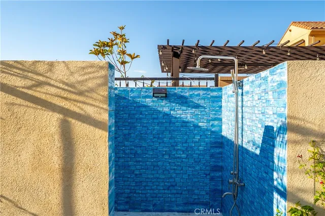 a view of swimming pool with outdoor seating