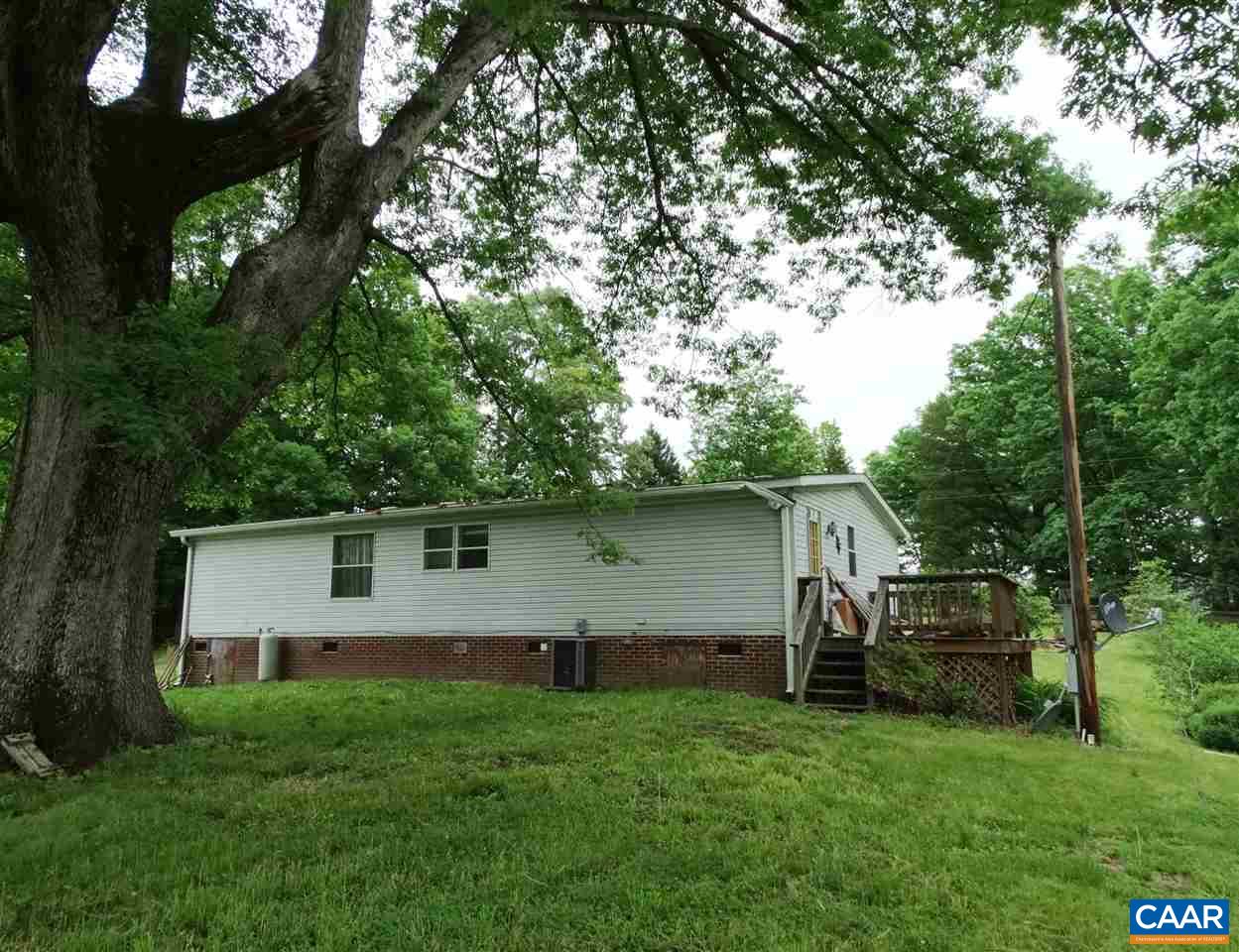1465 Race Ground Road Rochelle, VA 22738 - Photo 3 of 9 a front view of a house with garden
