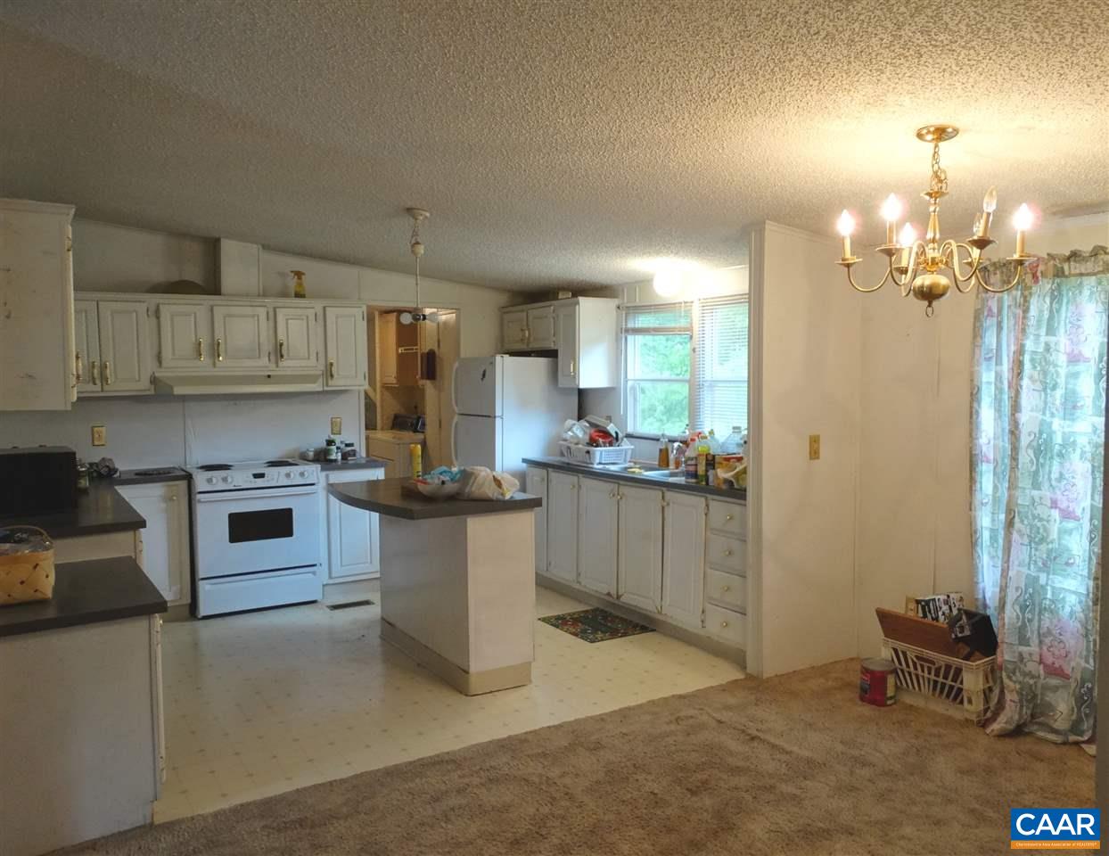 1465 Race Ground Road Rochelle, VA 22738 - Photo 5 of 9 a kitchen with a sink cabinets and window