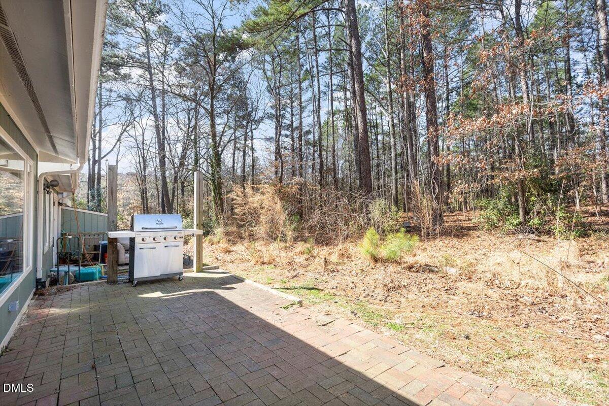 712 Godwin Court Raleigh, NC 27606 - Photo 22 of 27 a view of a back yard of the house