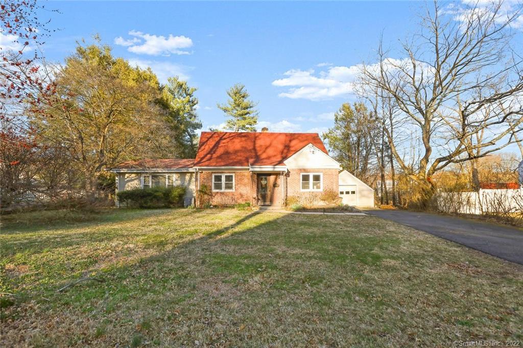 141 Knox Road Stamford, CT 06907 - Photo 1 of 1 a front view of a house with a yard