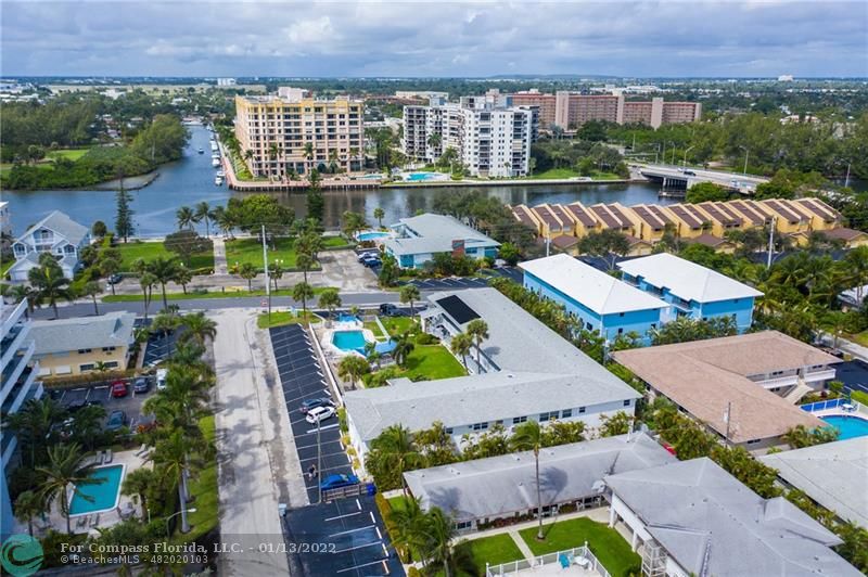 1210 North Riverside Drive, Unit 107 Pompano Beach, FL 33062 - Photo 2 of 29 an aerial view of multiple house