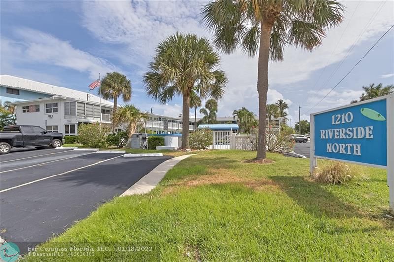 1210 North Riverside Drive, Unit 107 Pompano Beach, FL 33062 - Photo 22 of 29 a view of a street with palm trees