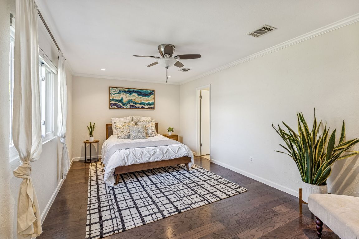 5502 Porsche Lane Austin, TX 78749 - Photo 17 of 32 Bedroom with crown molding, dark wood-style flooring, a ceiling fan, and recessed lighting