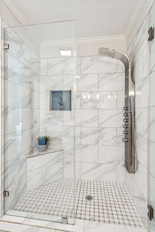 5502 Porsche Lane Austin, TX 78749 - Photo 21 of 32 Bathroom featuring a marble finish shower and crown molding