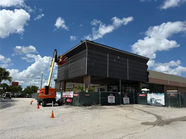 a view of a hallway with washer and dryer