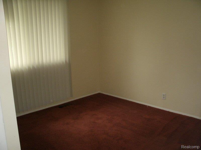 450 N Ridge South Lyon, MI 48178 - Photo 8 of 17 Bedroom 3.jpg