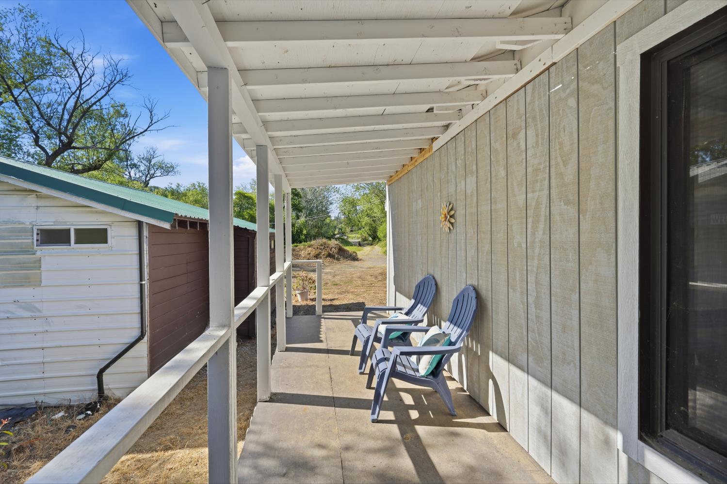 13351 Newtown Road Nevada City, CA 95959 - Photo 34 of 50 a balcony view with a large window and sitting space