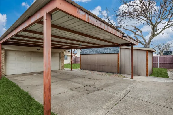 a view of backyard of a house
