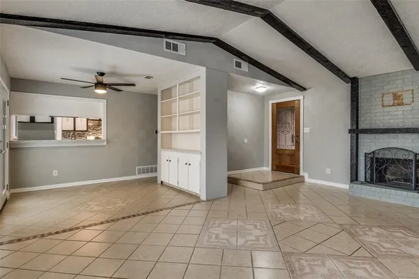 a view of a livingroom with a staircase
