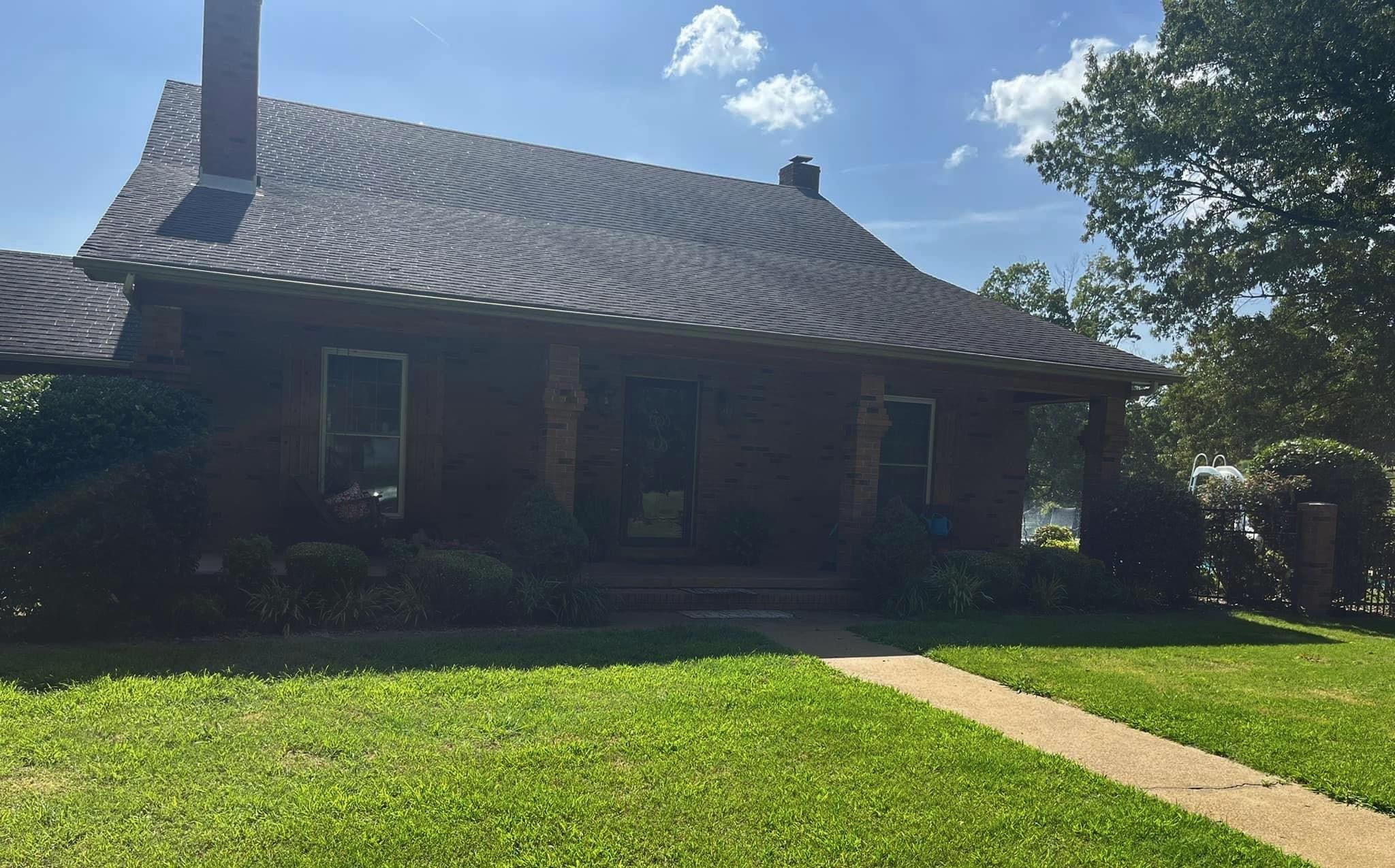 1057 Craig Road Ripley, TN 38063 - Photo 2 of 6 a house with a yard