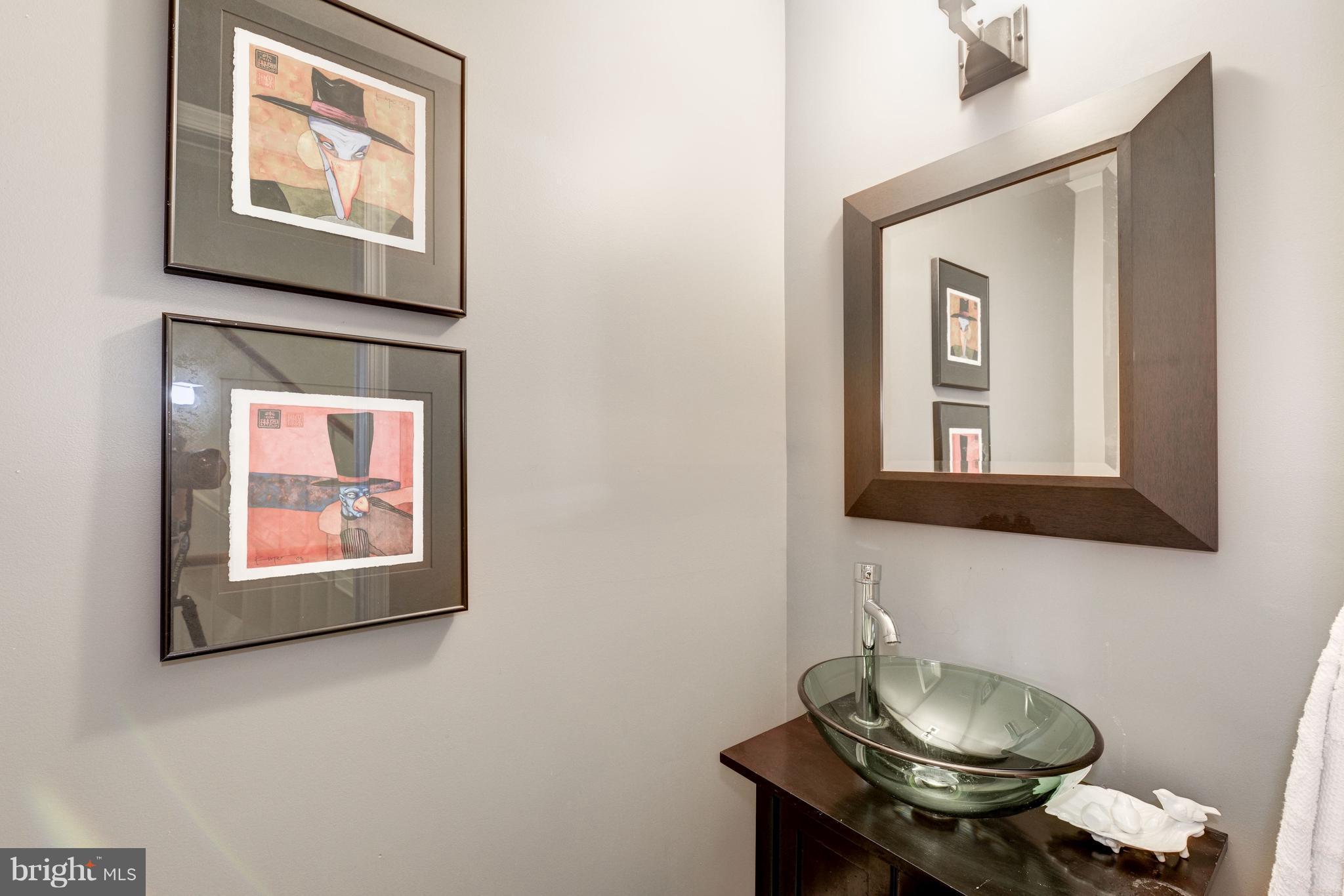 2100 Golf Course Drive Reston, VA 20191 - Photo 11 of 30 a bathroom with a mirror and a sink