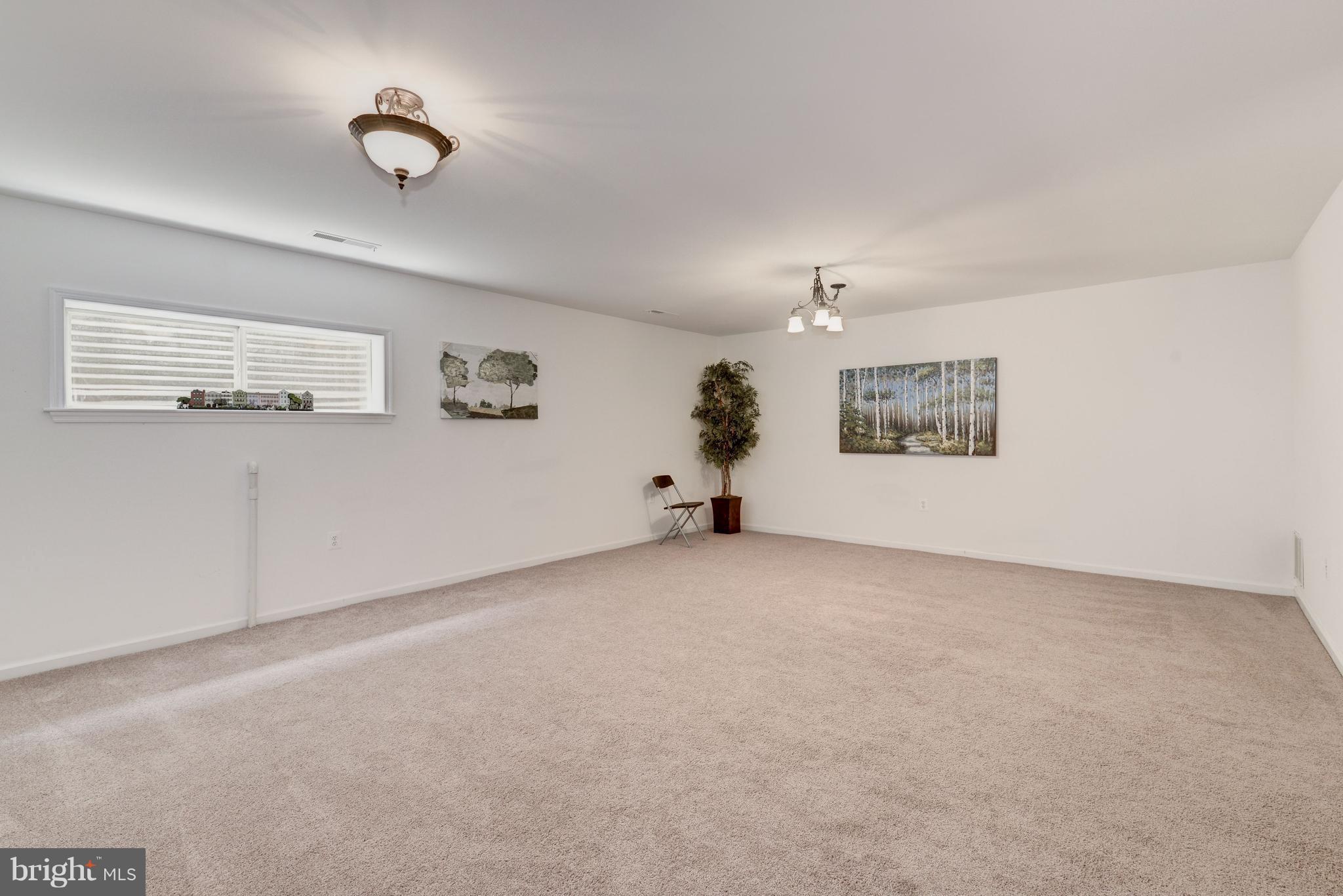 2100 Golf Course Drive Reston, VA 20191 - Photo 18 of 30 a view of an empty room with a window