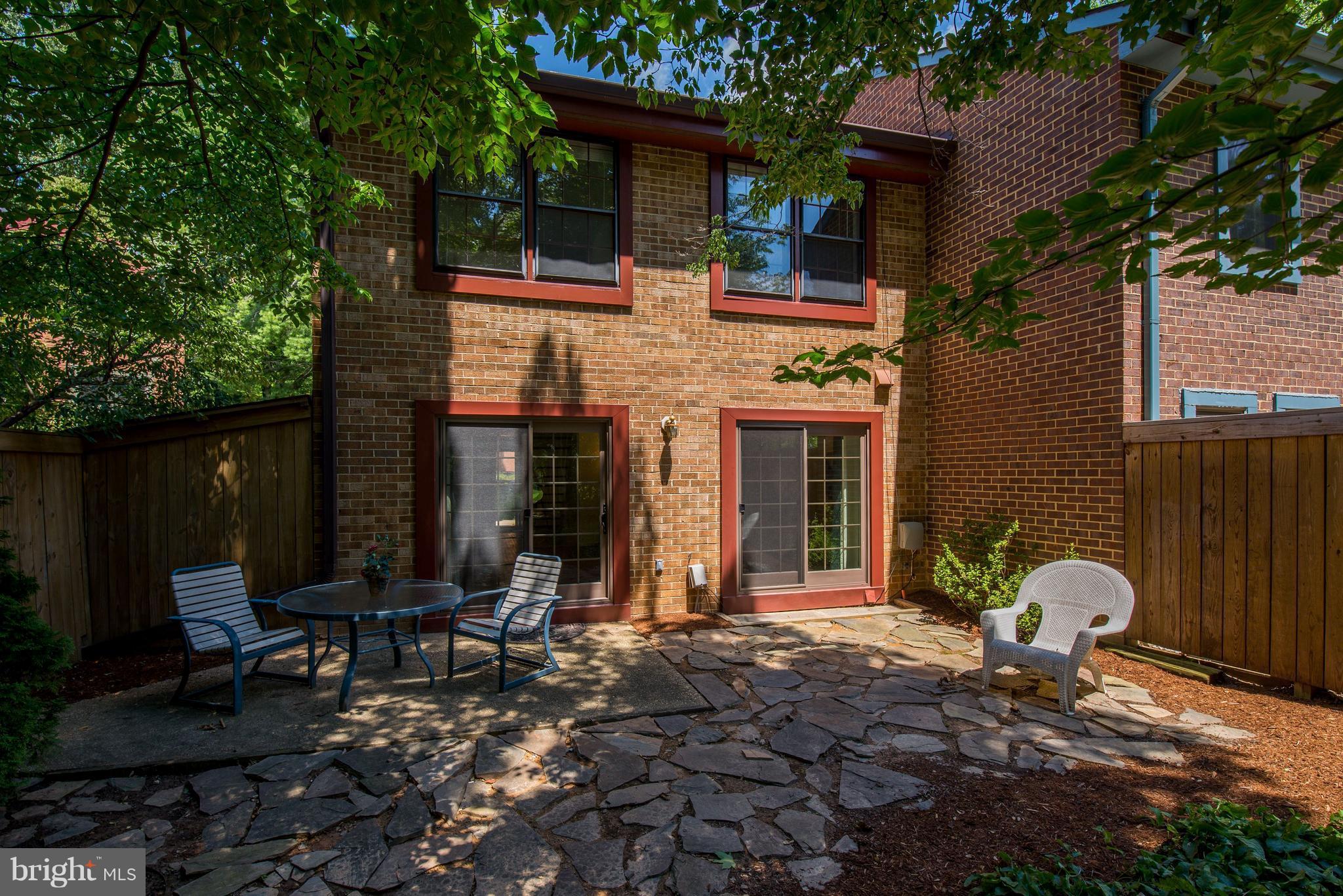 2100 Golf Course Drive Reston, VA 20191 - Photo 23 of 30 a view of a house with backyard and sitting area