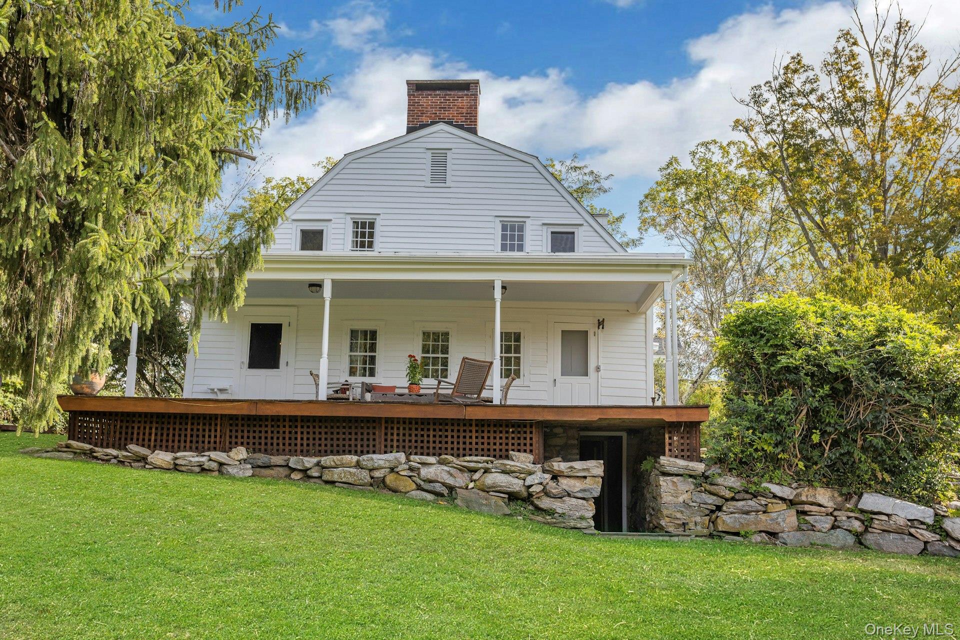 75 Cushman Road Patterson, NY 12563 - Photo 25 of 45 Expansive covered porch overlooking breath-taking property