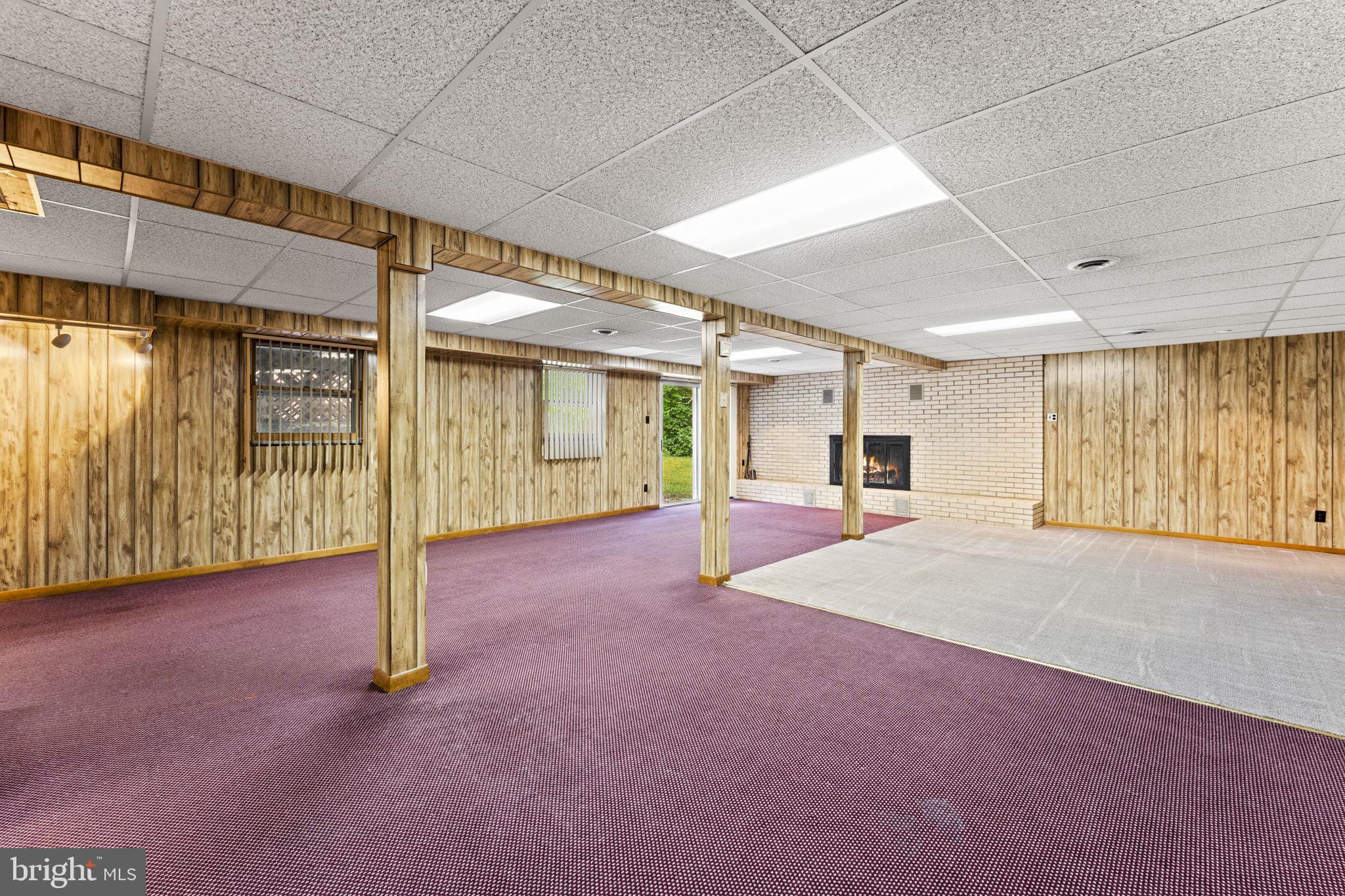 11053 Brent Town Road Catlett, VA 20119 - Photo 53 of 76 Spacious basement with cozy fireplace.