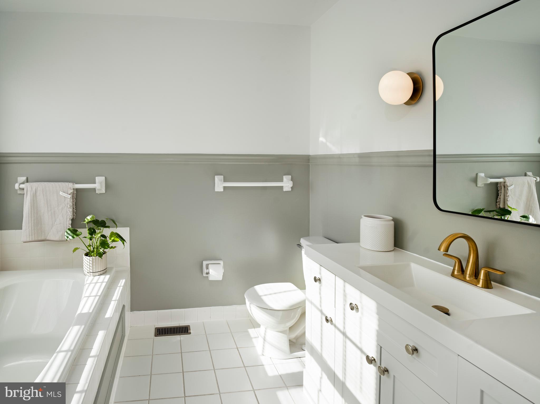 534 Pewter Drive Exton, PA 19341 - Photo 18 of 39 a bathroom with a sink a toilet and a mirror