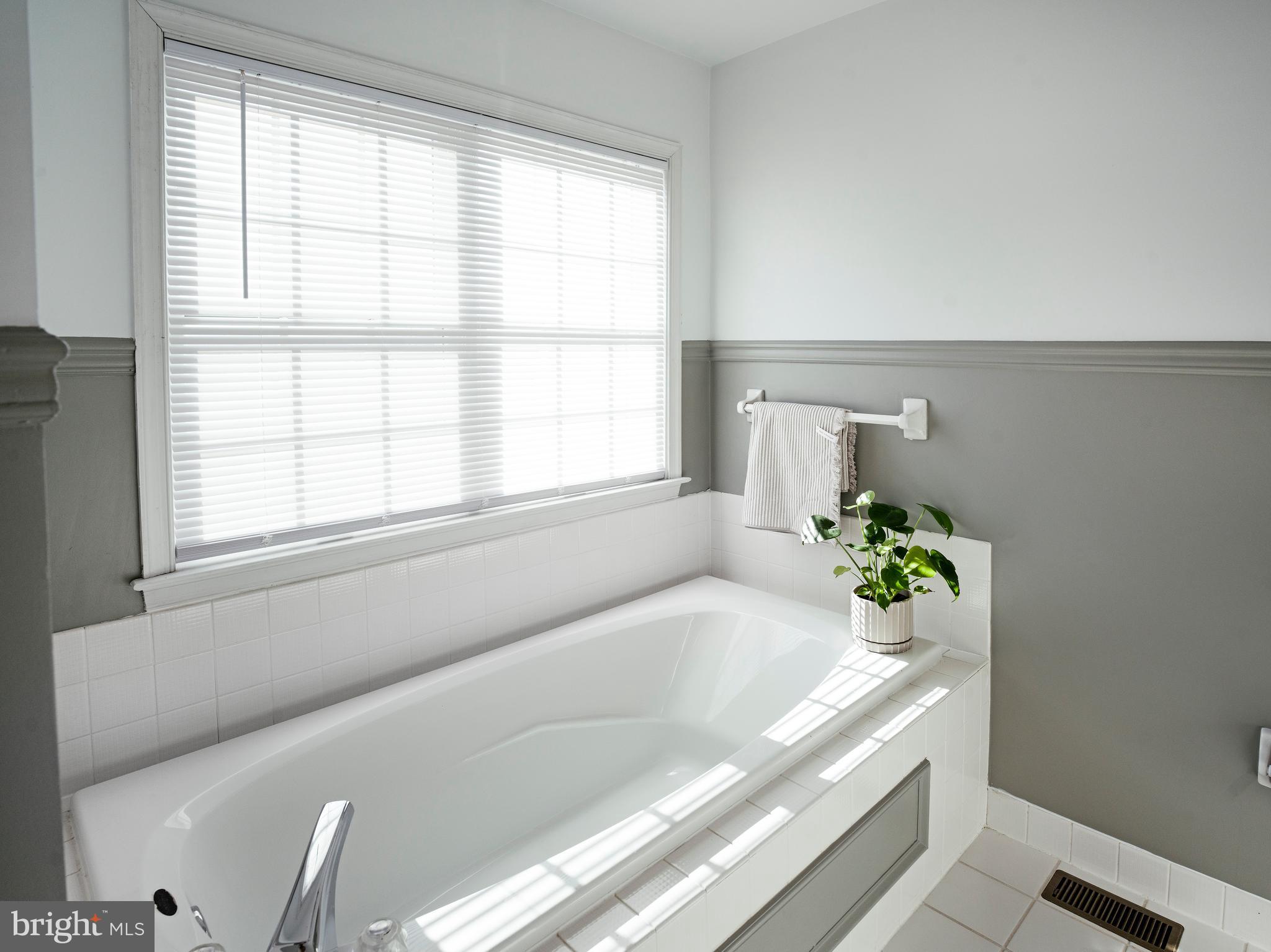 534 Pewter Drive Exton, PA 19341 - Photo 20 of 39 a bath tub sitting in a bathroom next to a window