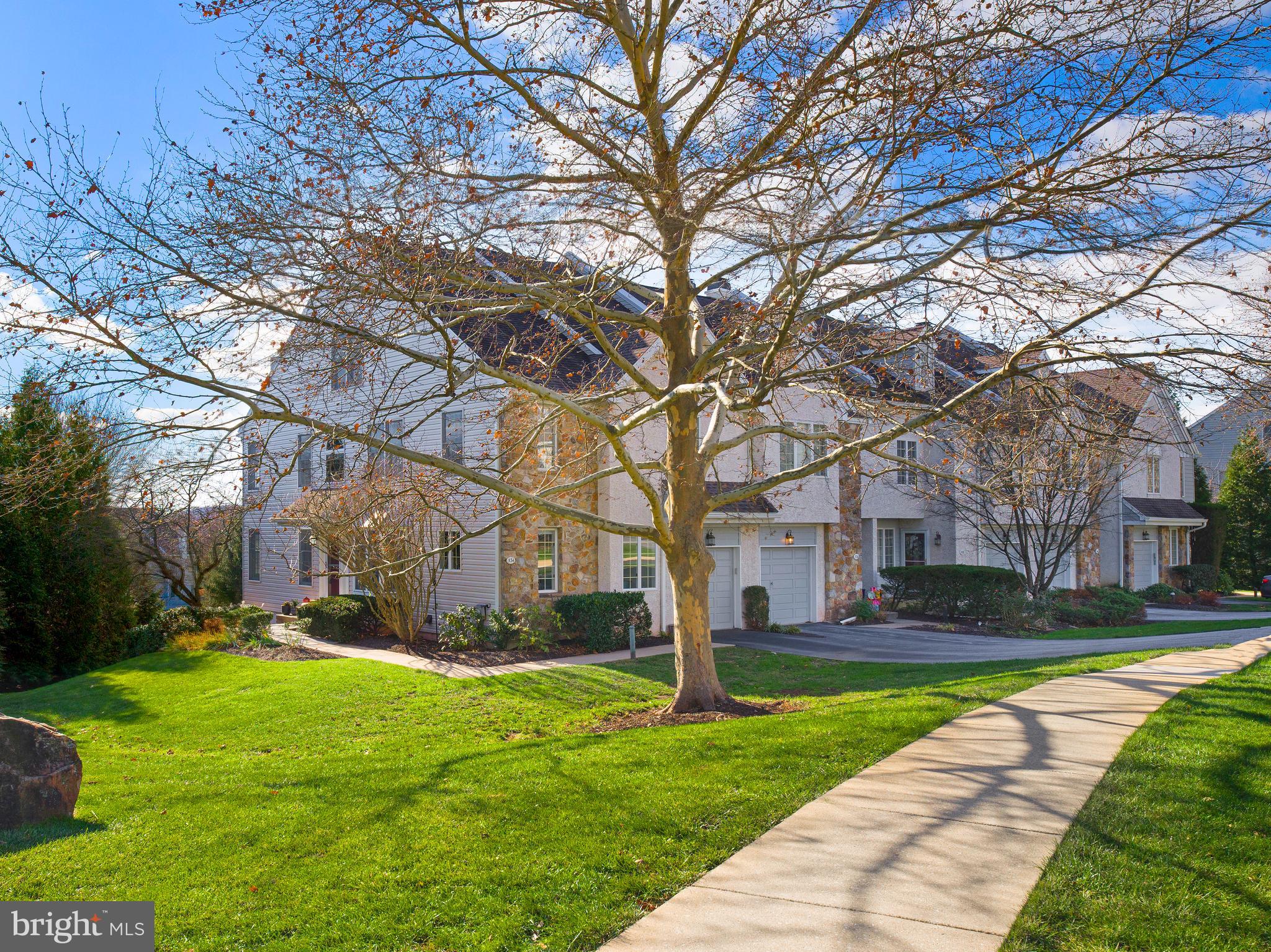 534 Pewter Drive Exton, PA 19341 - Photo 2 of 39 a garden view with large trees